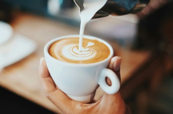 person making latte art